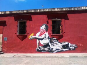 Mural of indigenous girl with covered face